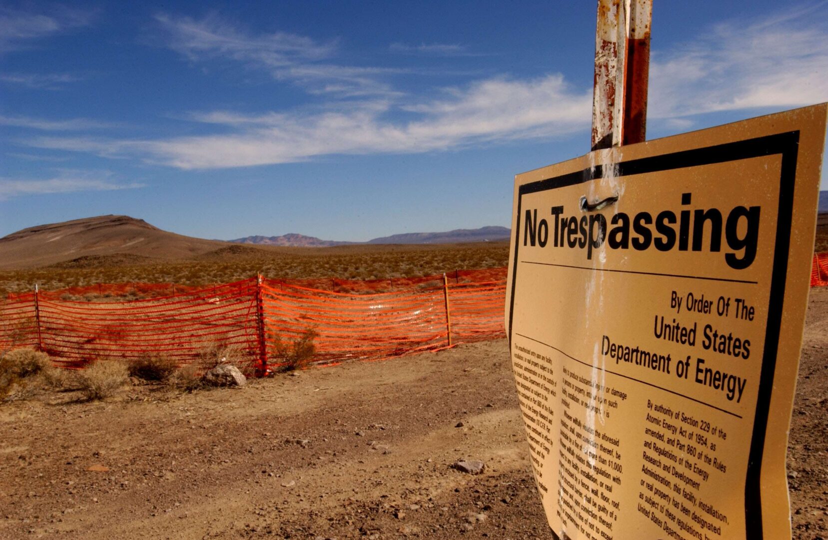 A “no trespassing” sign warns people to stay away from the proposed nuclear waste dump site of Yucca Mountain at Nellis Air Force Base in Nevada in February 2002. (David McNew/Getty Images file photo)