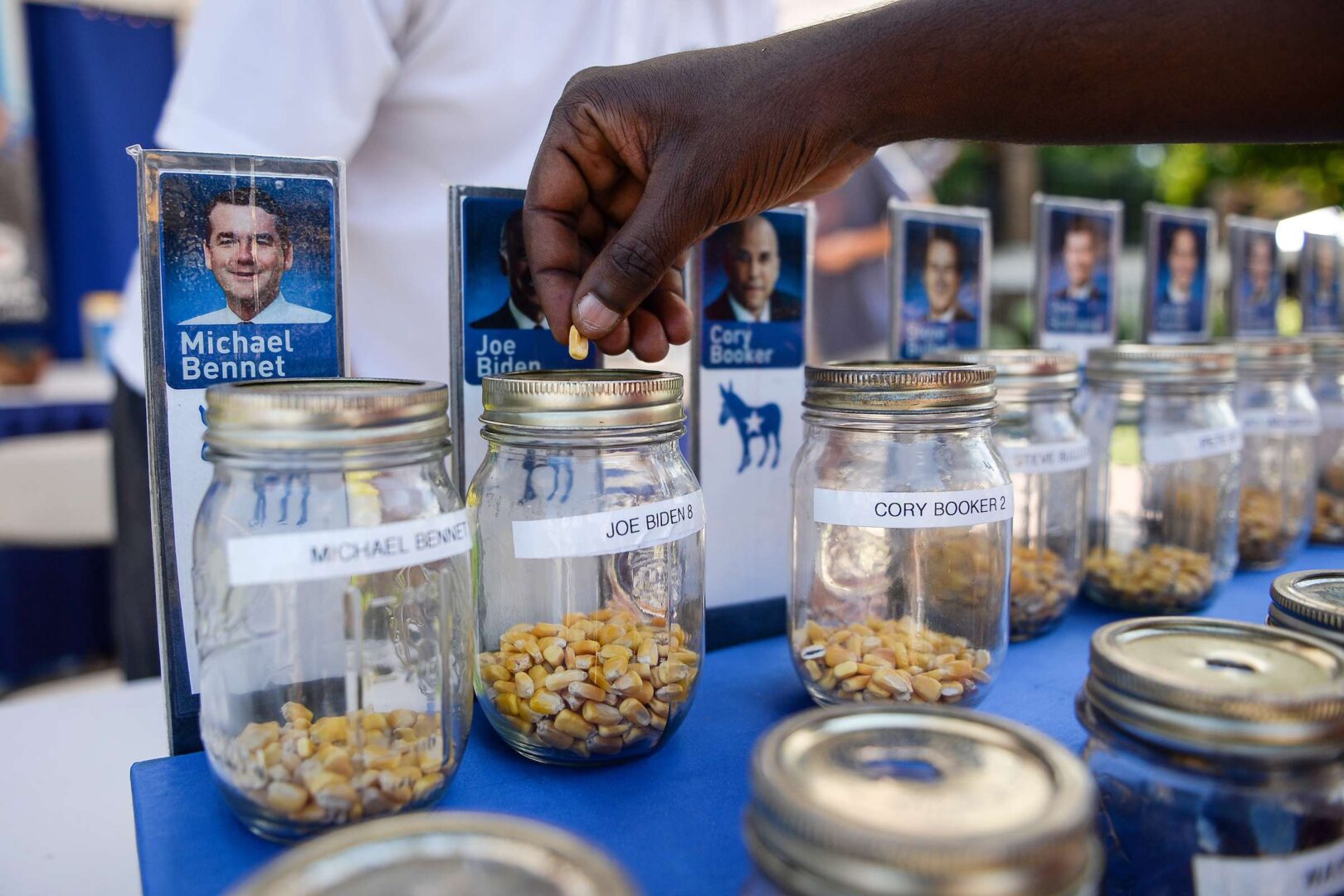 At the Iowa State Fair last August, each fairgoer was given one kernel of corn to "vote" for their presidential choice. The state party's use of a new app to tally votes at the Feb. 3 caucuses caused confusion and delays. (Caroline Brehman/CQ Roll Call)