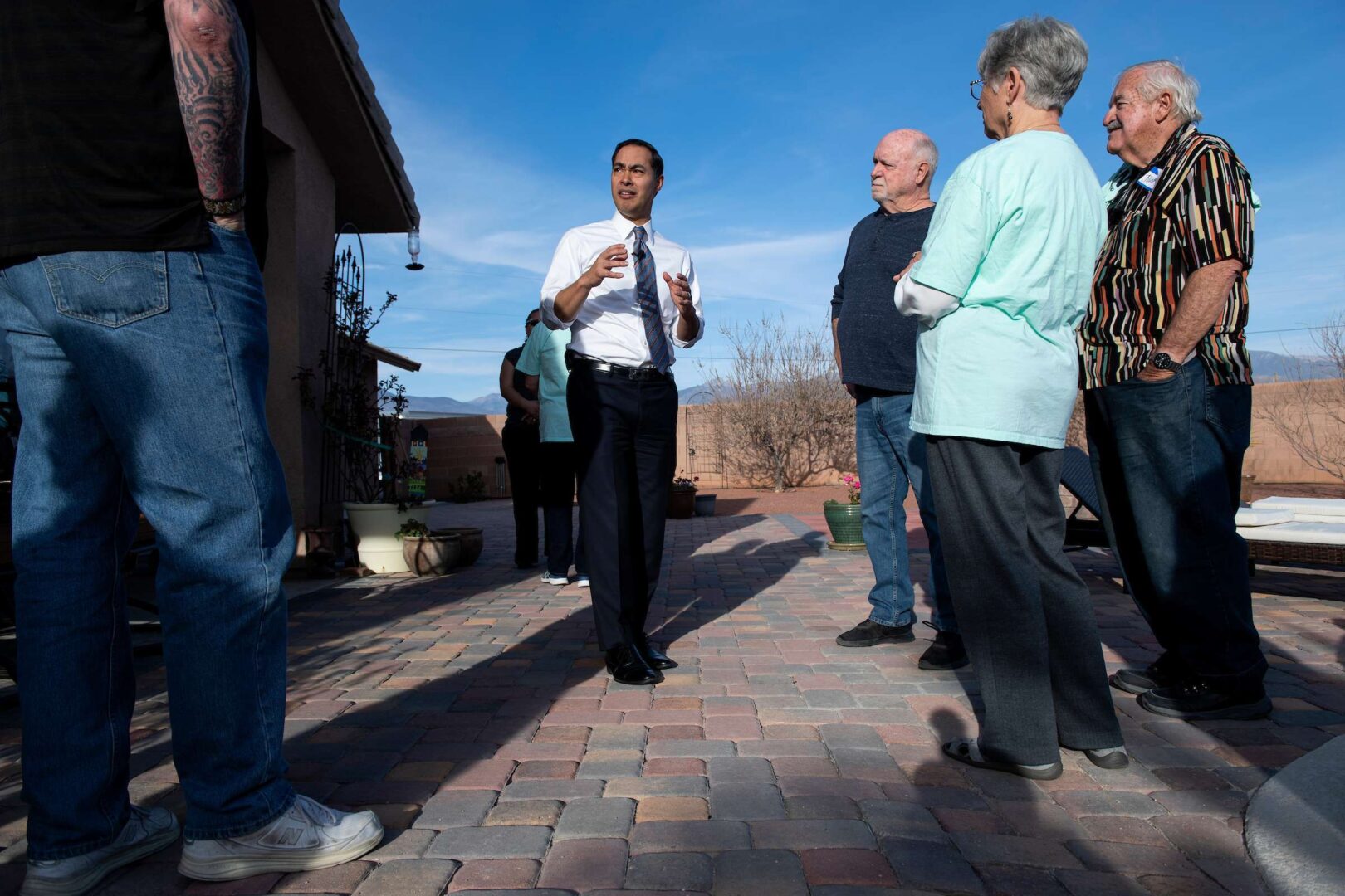 Former 2020 hopeful Julián Castro campaigns for Sen. Elizabeth Warren on Monday at the house of a caucus captain in Pahrump, Nev. (Caroline Brehman/CQ Roll Call)
