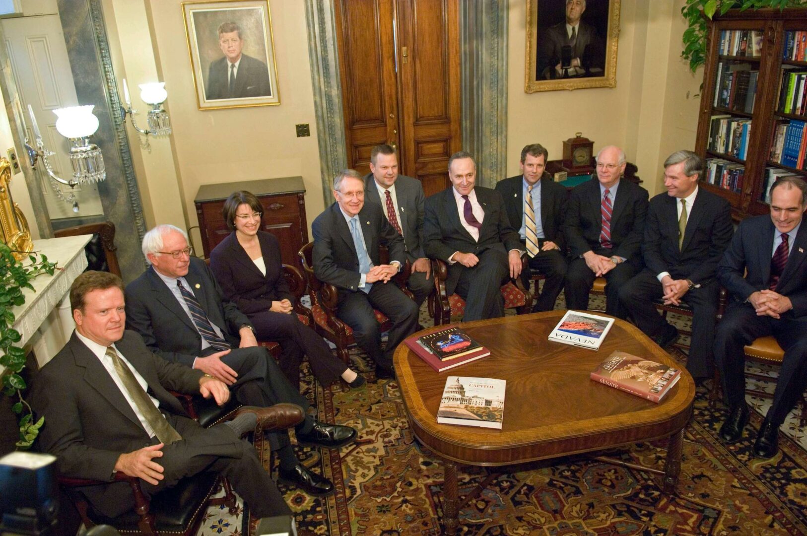 Sens. Bernie Sanders and Amy Klobuchar, seen here in a photo-op for Democratic senators-elect in November 2006, began their Senate careers the same day.