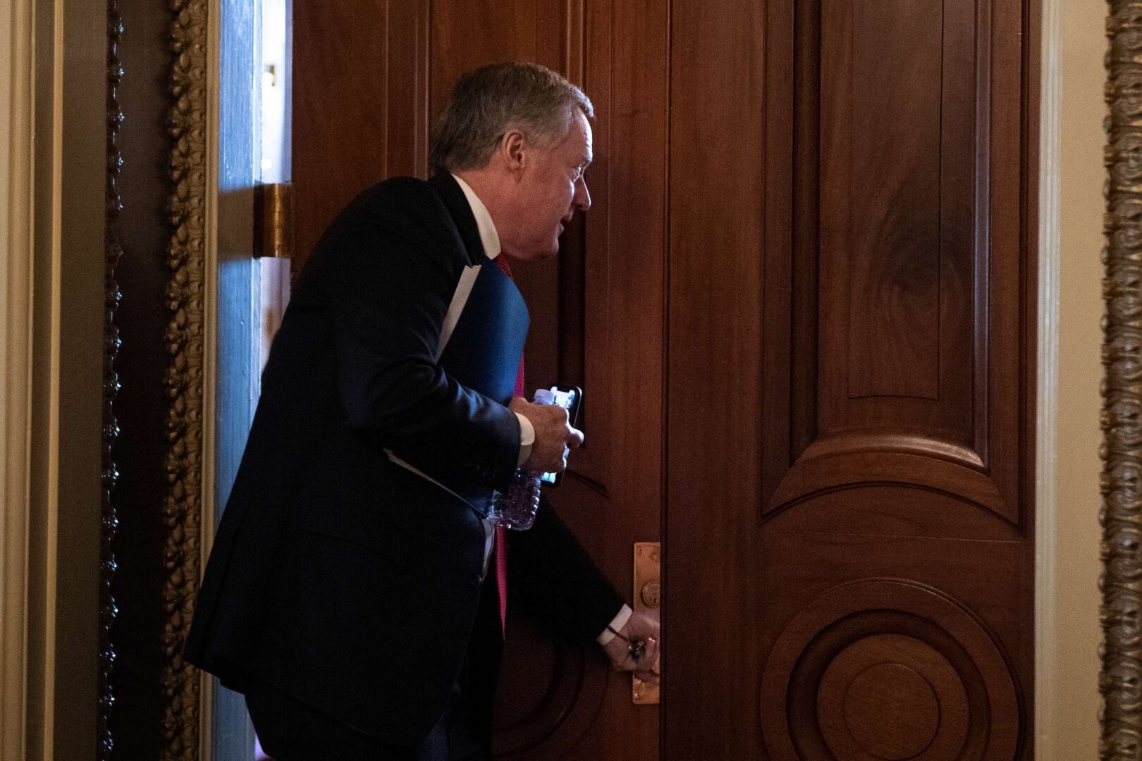 Incoming White House Chief of Staff Rep. Mark Meadows, R-N.C., enters a meeting in the Capitol as negotiations continue with congressional leadership on a financial relief package for COVID-19 on Tuesday. 