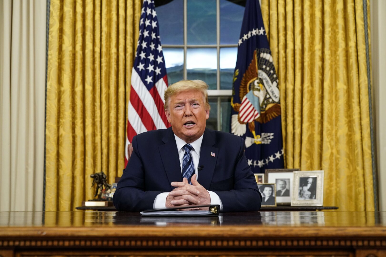 President Donald Trump addresses the nation from the Oval Office about the widening coronavirus crisis on Wednesday.