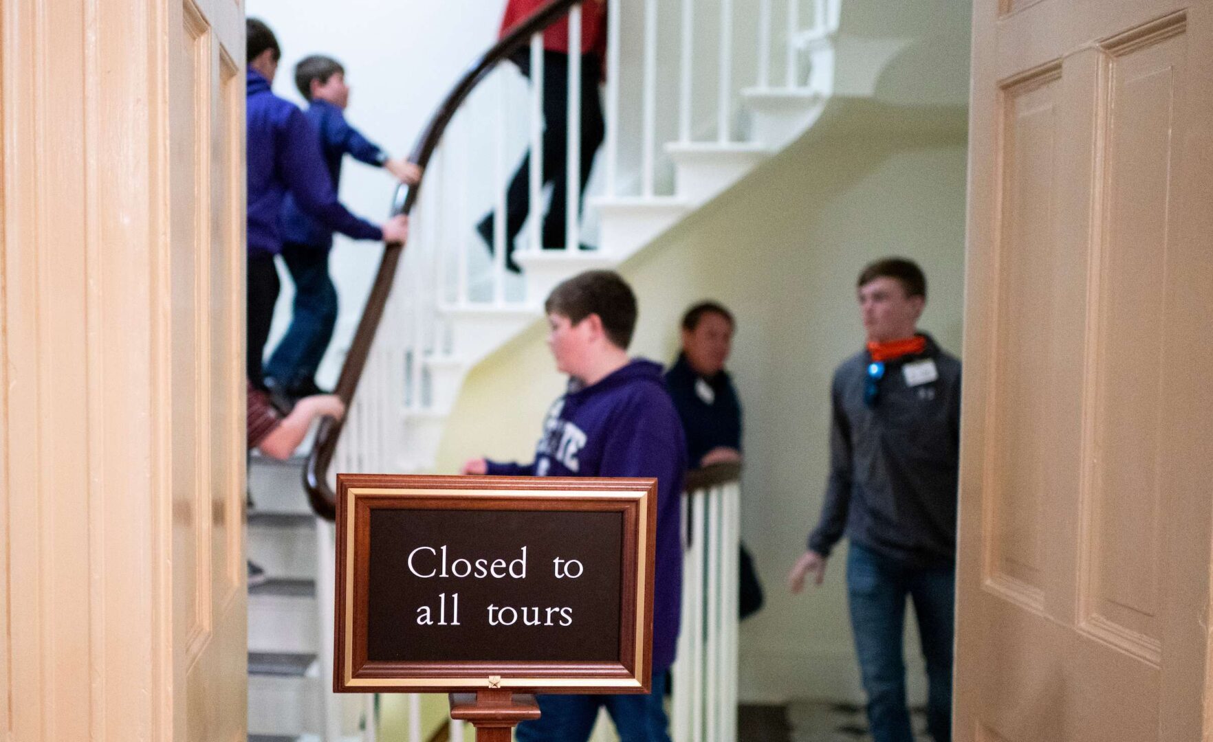A tour groups walks up a stairwell usually closed to tourists in the Capitol on Thursday, a day before the sergeants-at-arms ended tours over the coronavirus. 