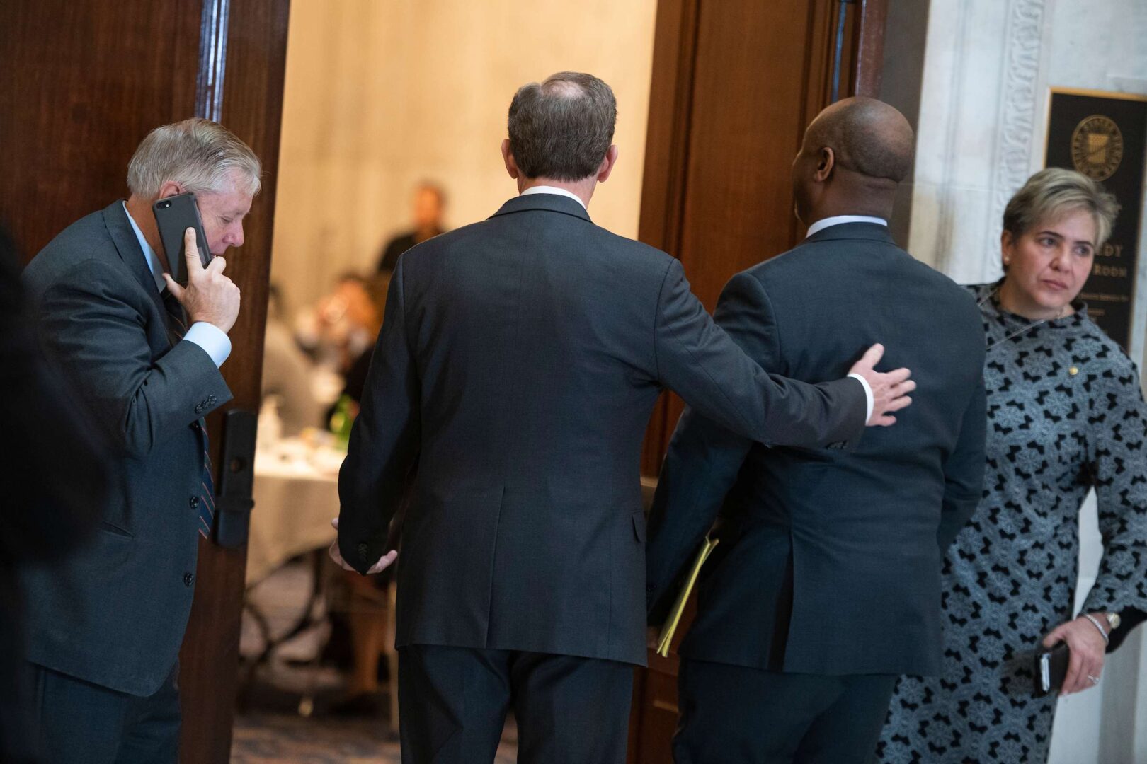 Not exactly social distancing: From left, Sens. Lindsey Graham, R-S.C., Pat Toomey, R-Pa., and Tim Scott, R-S.C., arrive at the Senate Republican Policy luncheon in Russell Building on Tuesday, March 17, 2020.