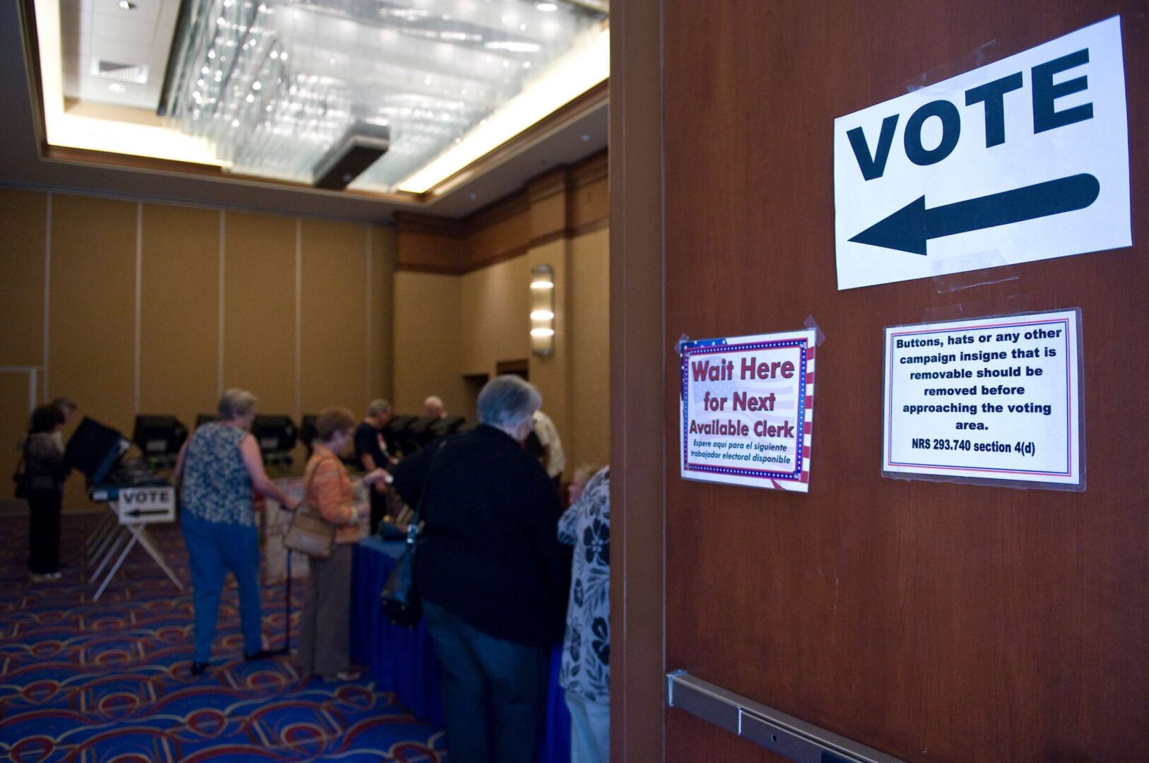 An early voter casts her ballot in Henderson, Nev., in 2010. On Saturday, Georgia's secretary of state postponed the state’s presidential primary, set for March 24, because of concerns about the coronavirus.