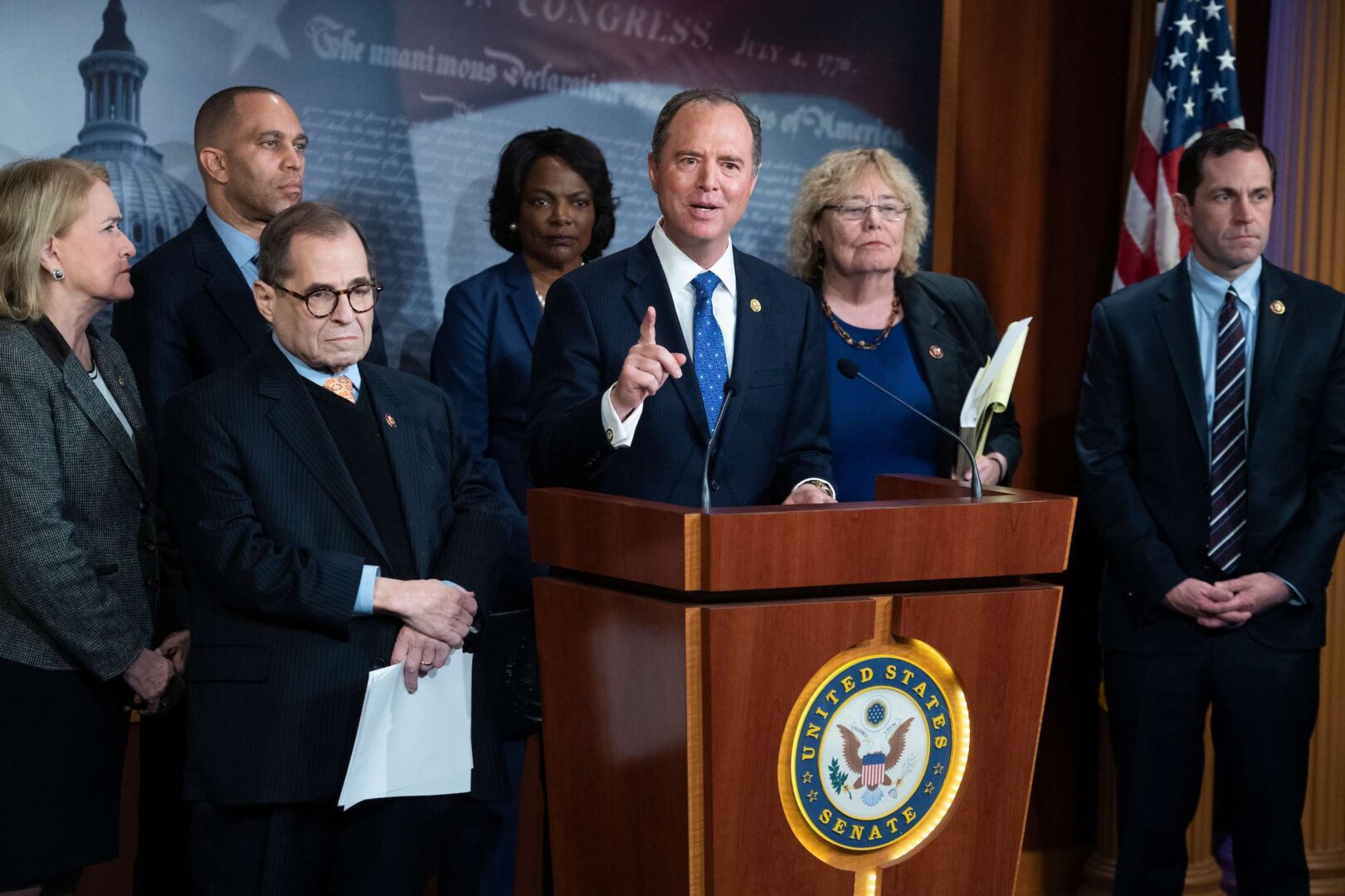 House impeachment managers from left, Reps. Sylvia Garcia, D-Texas, Hakeem Jeffries, D-N.Y., Jerrold Nadler, D-N.Y., Val Demings, D-Fla., Adam Schiff, D-Calif., Zoe Lofgren, D-Calif., and Jason Crow, D-Colo., are forever linked, according to the group.