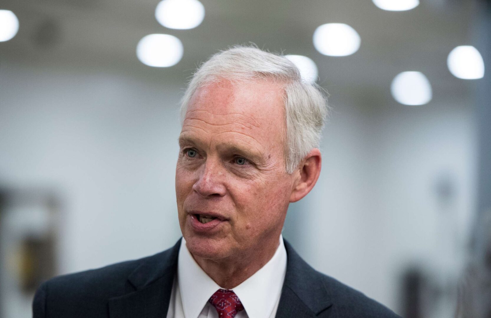 Sen. Ron Johnson, R-Wisc., speaks with a reporter in the Senate subway on Sept. 24, 2019.