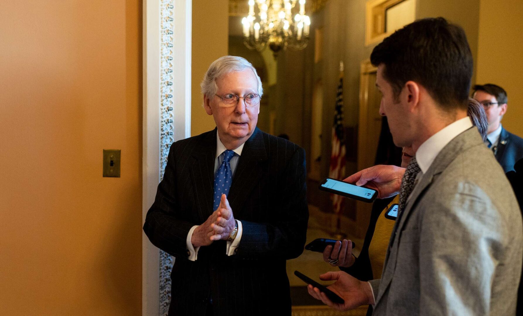 Senate Majority Leader Mitch McConnell, R-Ky., speaks to reporters about the Coronovirus supplemental funding bill as he rubs Purell sanitizer on his hands in the Capitol on Wednesday, March 4, 2020. 