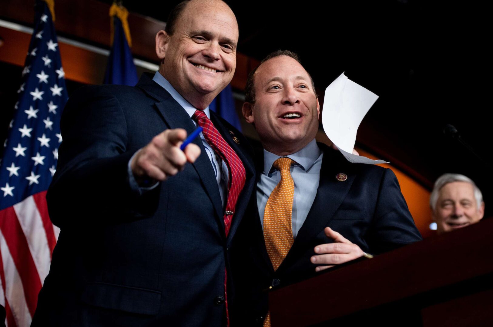 Problem Solvers Caucus Co-Chairmen Tom Reed, R-N.Y., and Josh Gottheimer, D-N.J., pictured at a press conference in the Capitol in February, have with their caucus come up with bipartisan benchmarks for reopening the economy.