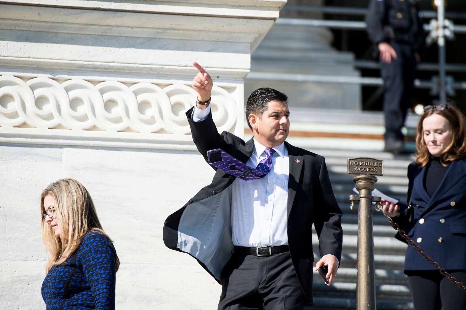 Rep. Raul Ruiz, D-Calif., motions to his ride as he walks down the House steps following the last votes of the week in the Capitol on Oct. 18, 2019.