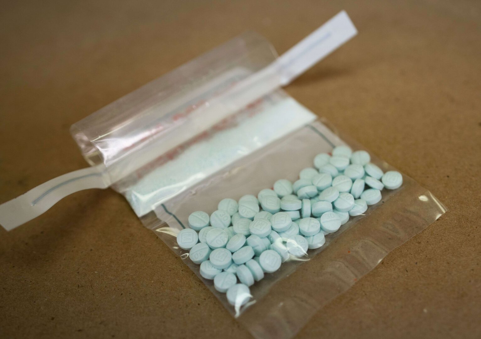 Tablets believed to be laced with fentanyl are displayed at the Drug Enforcement Administration Northeast Regional Laboratory in New York. 