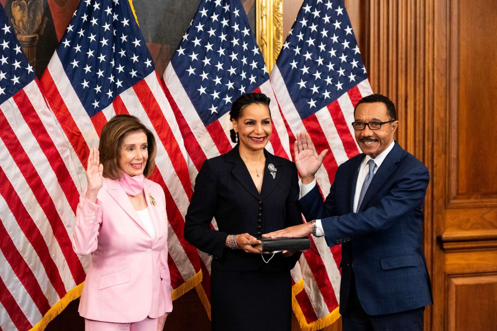 UNITED STATES - MAY 4: Rep. Kweisi Mfume, D-Md., right, poses during his ceremonial swear-in with Speaker of the House Nancy Pelosi, D-Calif., and his wife Tiffany Mfume in the Capitol on Tuesday, May 5, 2020. (Photo By Bill Clark/CQ Roll Call)