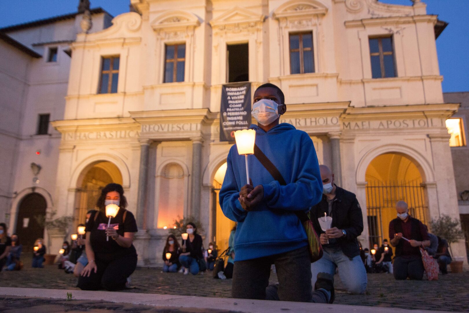 Young people in Rome  participate in a flashmob on Tiber Island on June 9 to affirm the need to combat all forms of racism, social discrimination and violence, joining the U.S. "Black Lives Matter" movement. 