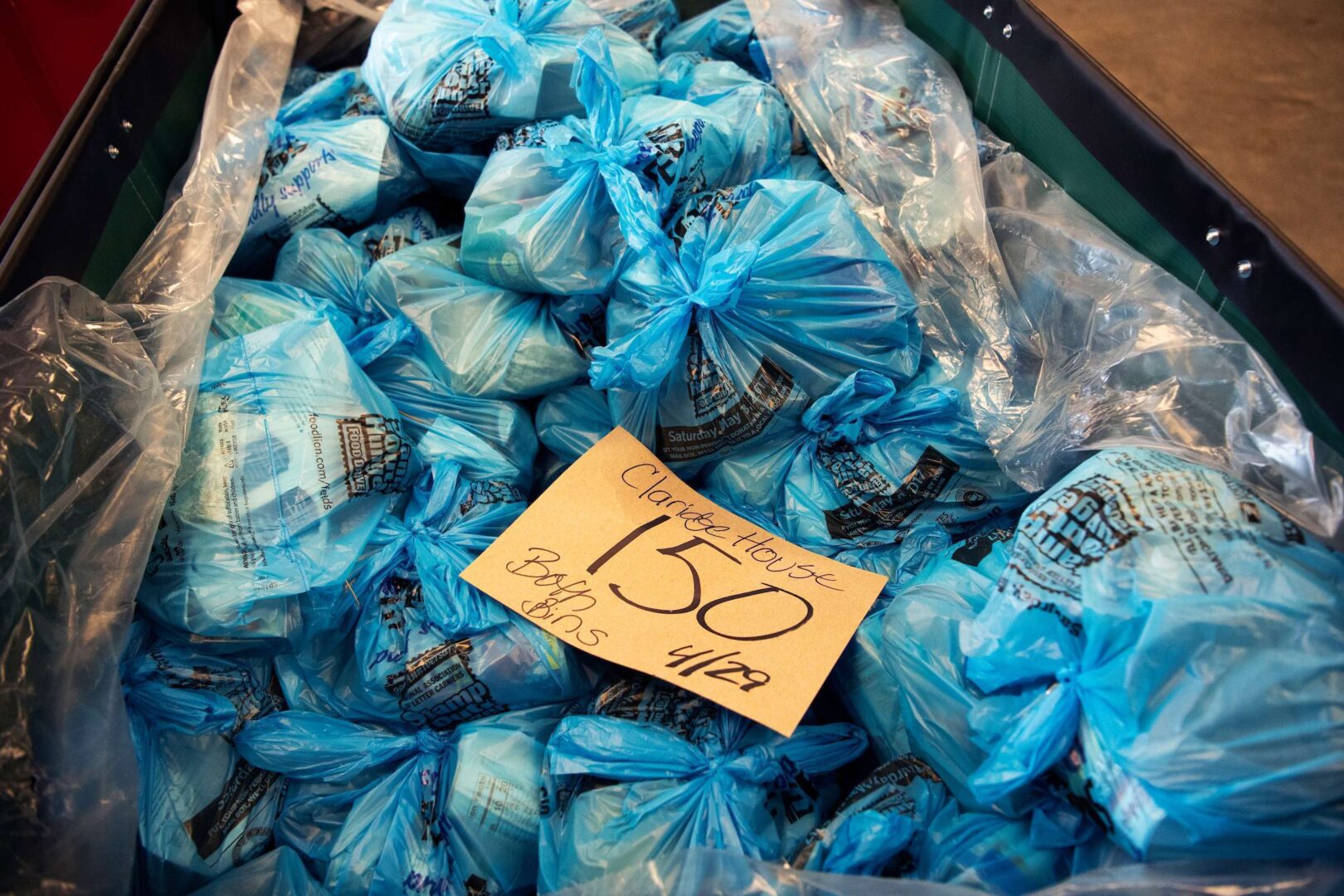 Grocery bags bound for an apartment building are seen at the Arlington Food Assistance Center in Virginia on May 4, 2020. The center has seen an increase in demand because of the COVID-19 pandemic.