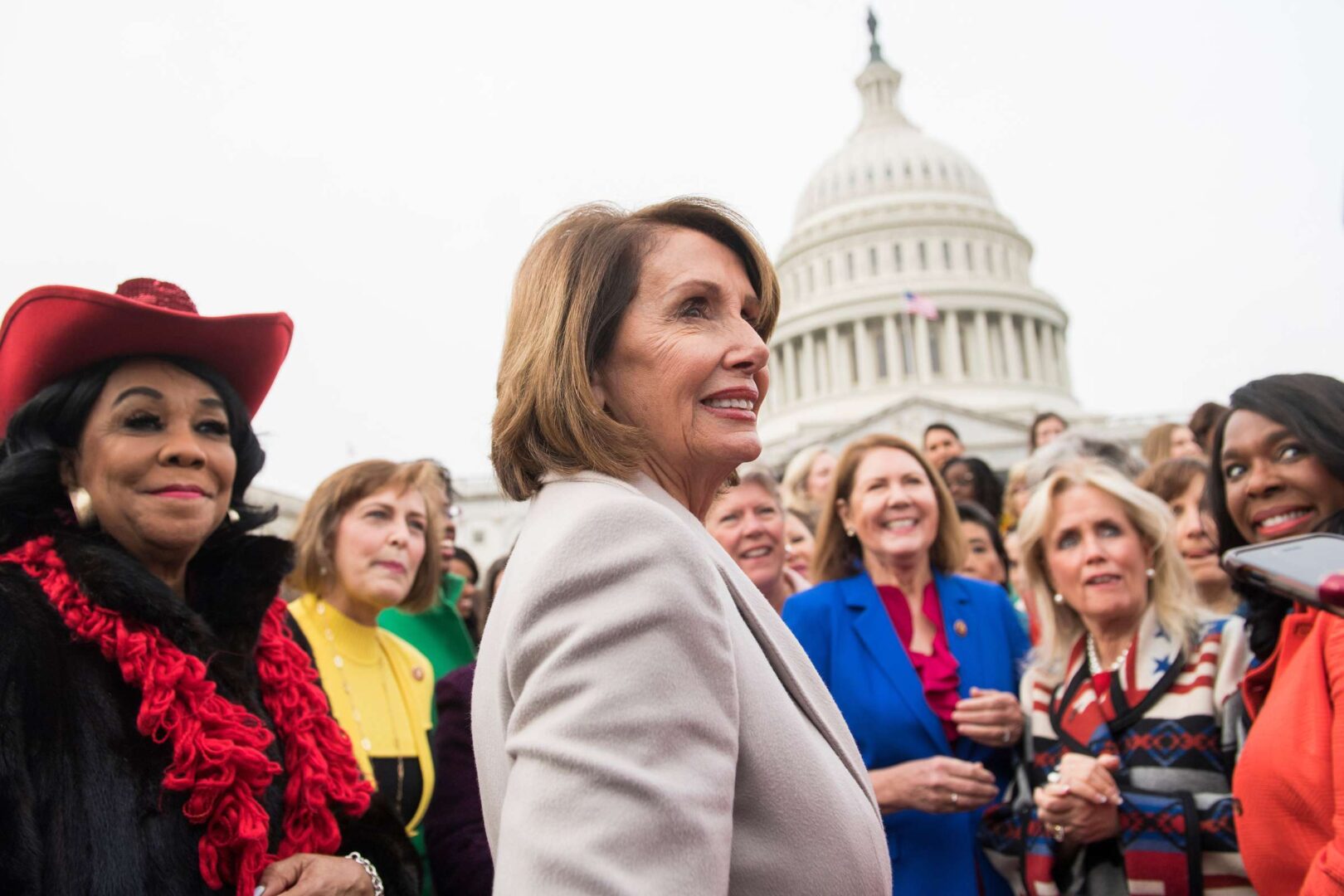 Speaker Nancy Pelosi, D-Calif., center, announced Wednesday that the House will soon vote on on a bill from Rep. Frederica S. Wilson, left, to establish a Commission on the Social Status of Black Men and Boys.