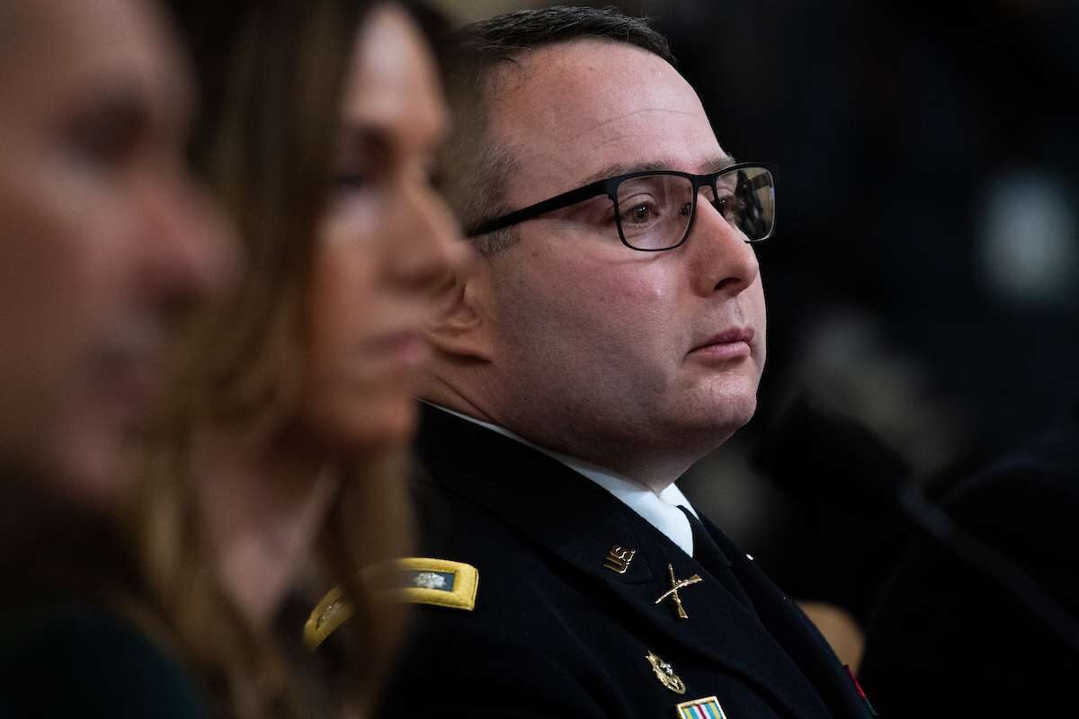 Lt. Col. Alexander Vindman, director of European affairs at the National Security Council, and Jennifer Williams, an aide to Vice President Mike Pence, testify during the House Intelligence Committee hearing on the impeachment inquiry of President Trump in Nov. 19, 2019. (Tom Williams/CQ Roll Call)