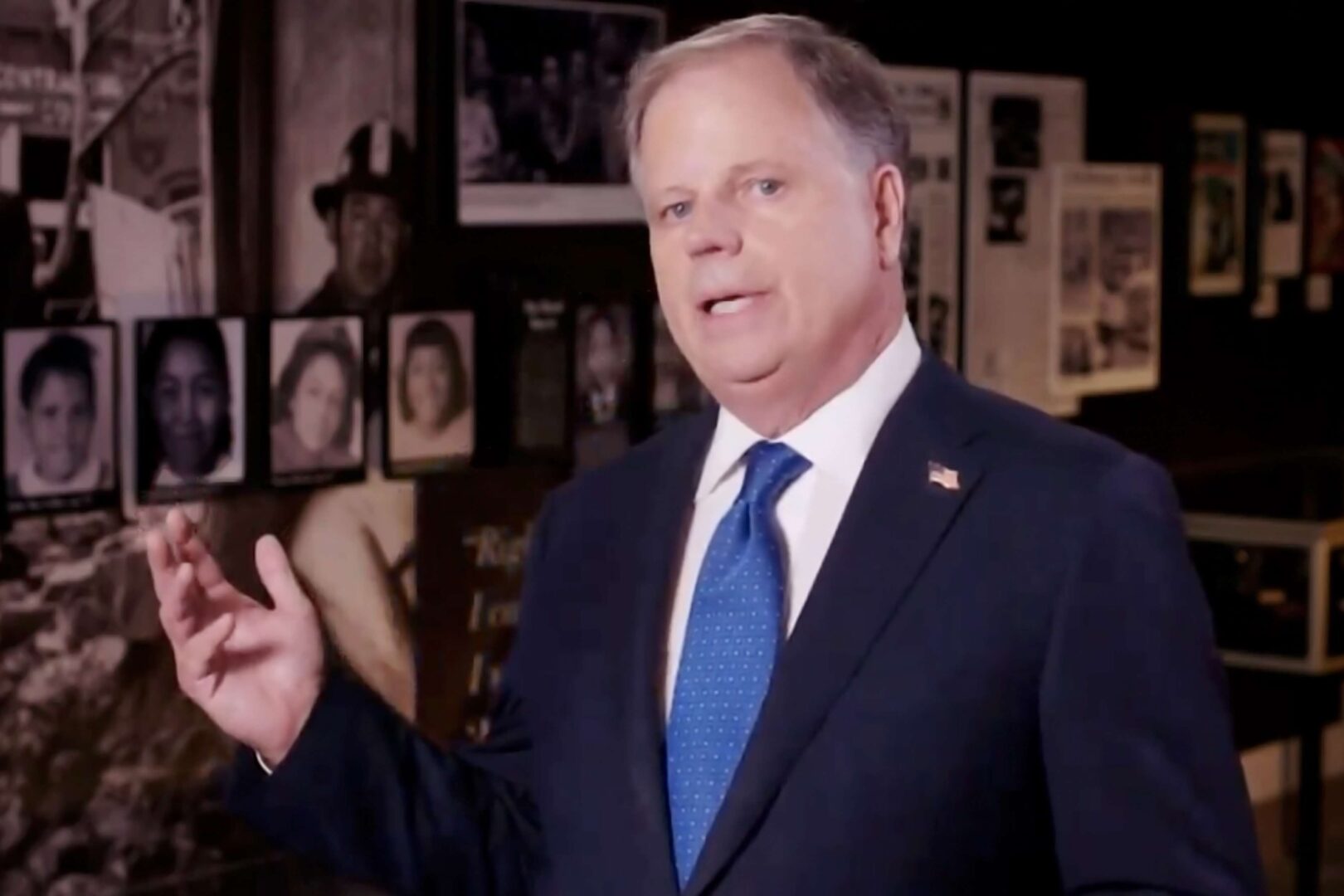 In this screenshot from the 2020 Democratic National Convention’s livestream on Monday, Alabama Sen. Doug Jones stands in front of an exhibit commemorating the 1963 bombing of the 16th Street Baptist Church in Birmingham.