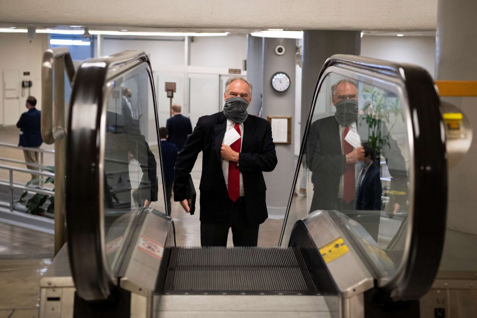 UNITED STATES - JULY 21: Sen. Tim Kaine, D-Va., walks through the Senate Subway on Tuesday, July 21, 2020. (Photo by Caroline Brehman/CQ Roll Call)
