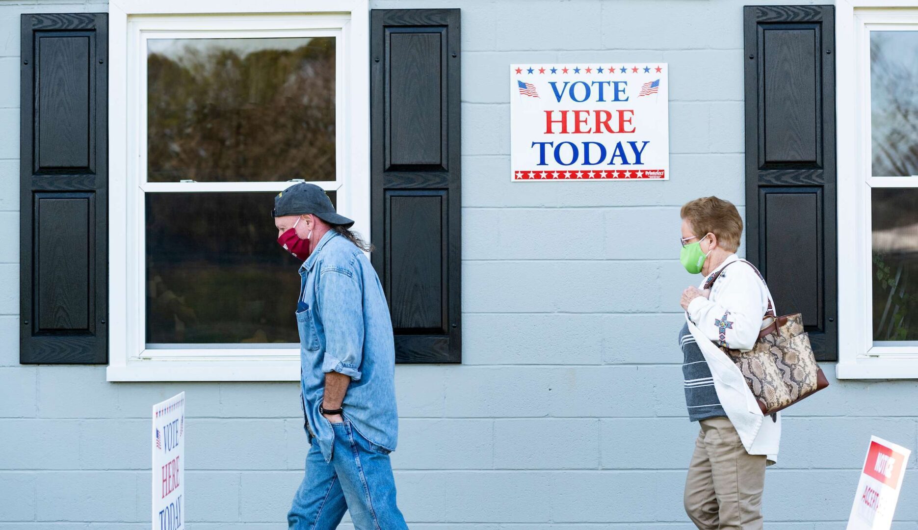 People arrive at the Ruckersville Volunteer Fire Company in Ruckersville, Va., to cast their votes on Election Day.