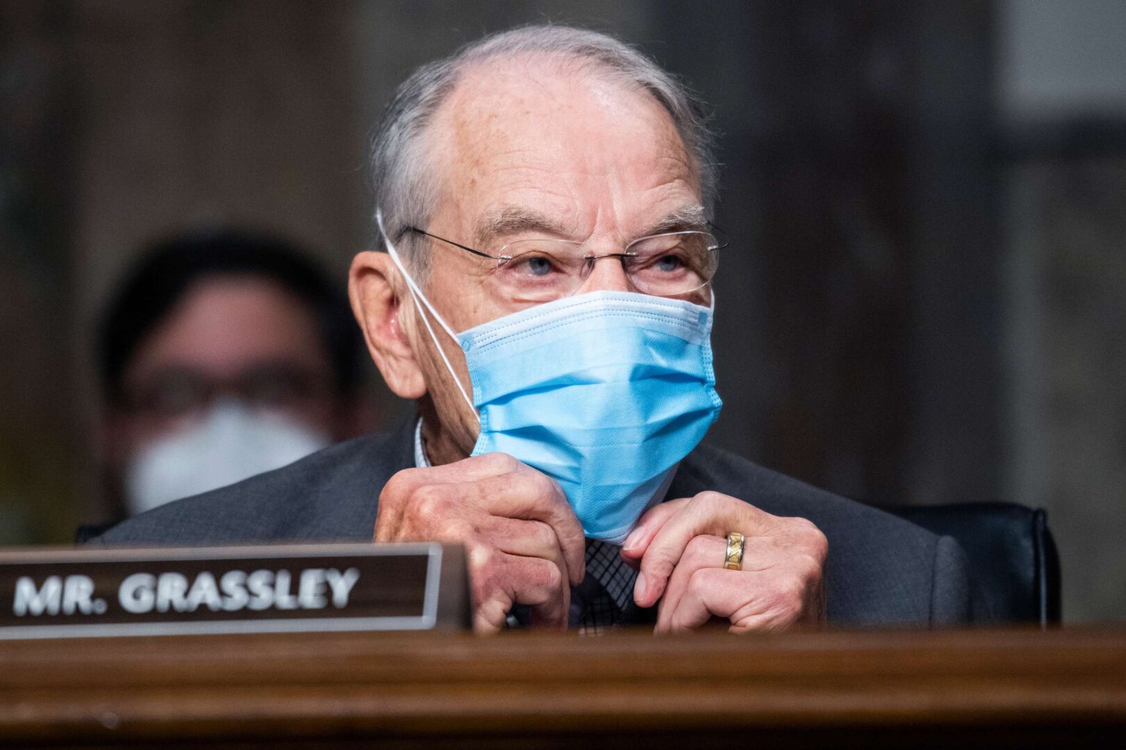 Iowa Sen. Charles E. Grassley says a Trump veto of the aid package would hurt farmers.