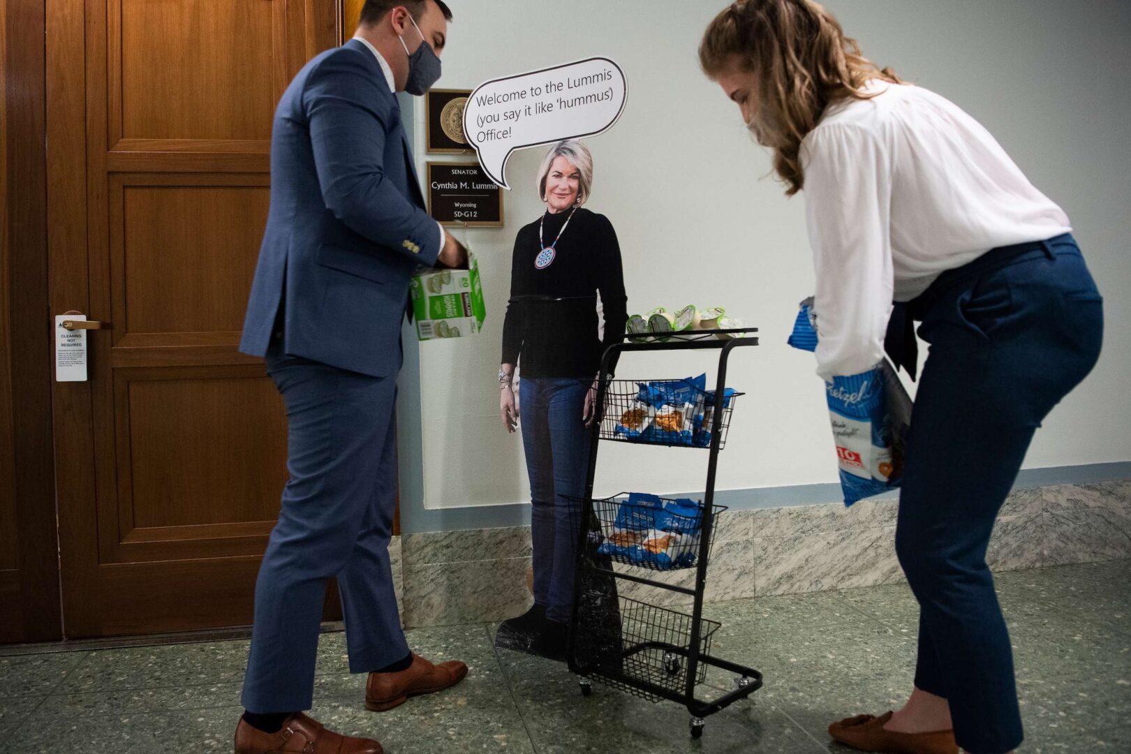 Aides for Sen. Cynthia Lummis, R-Wyo., set up a cut out with pretzels and hummus, reminding of the proper pronunciation of her name in Dirksen Building on Tuesday, January 5, 2021.
