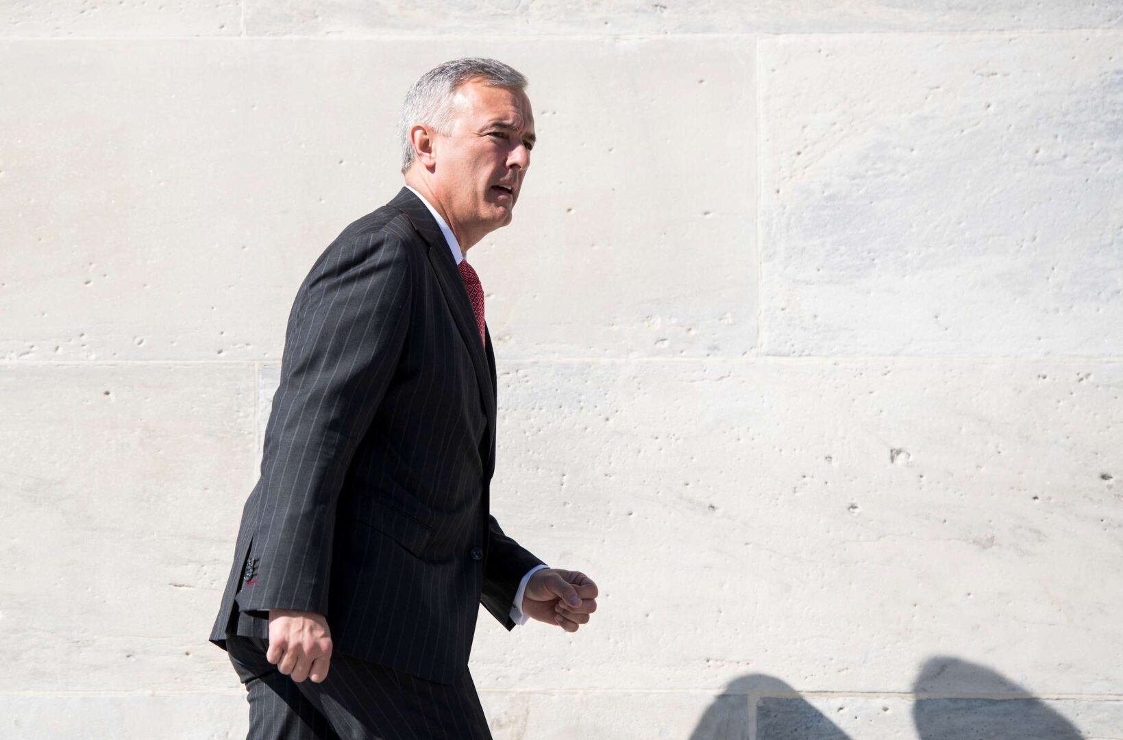 Rep. John Katko, R-N.Y., walks up the House steps for final votes of the week on March 8, 2018.
