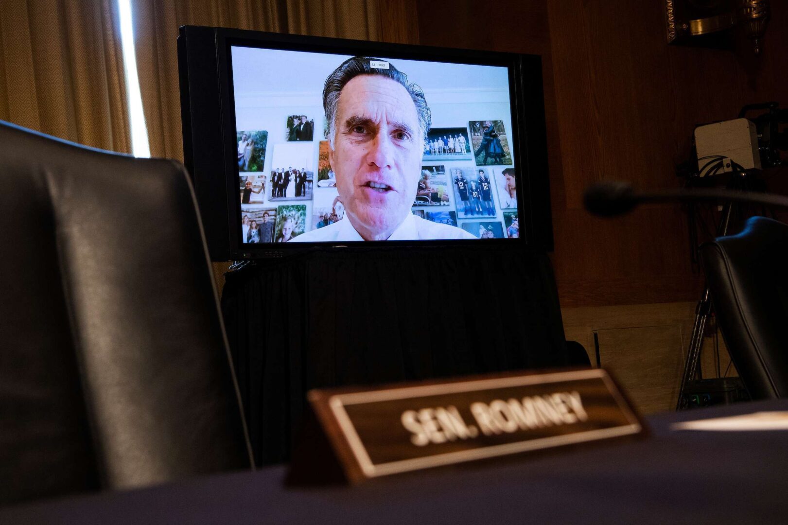 Sen. Mitt Romney participates remotely in a hearing of the Senate Homeland Security and Governmental Affairs Committee in June 2020.