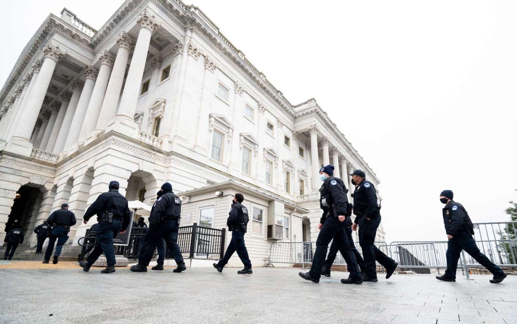U.S. Capitol Police officers enter the Capitol on Feb. 11, 2021.