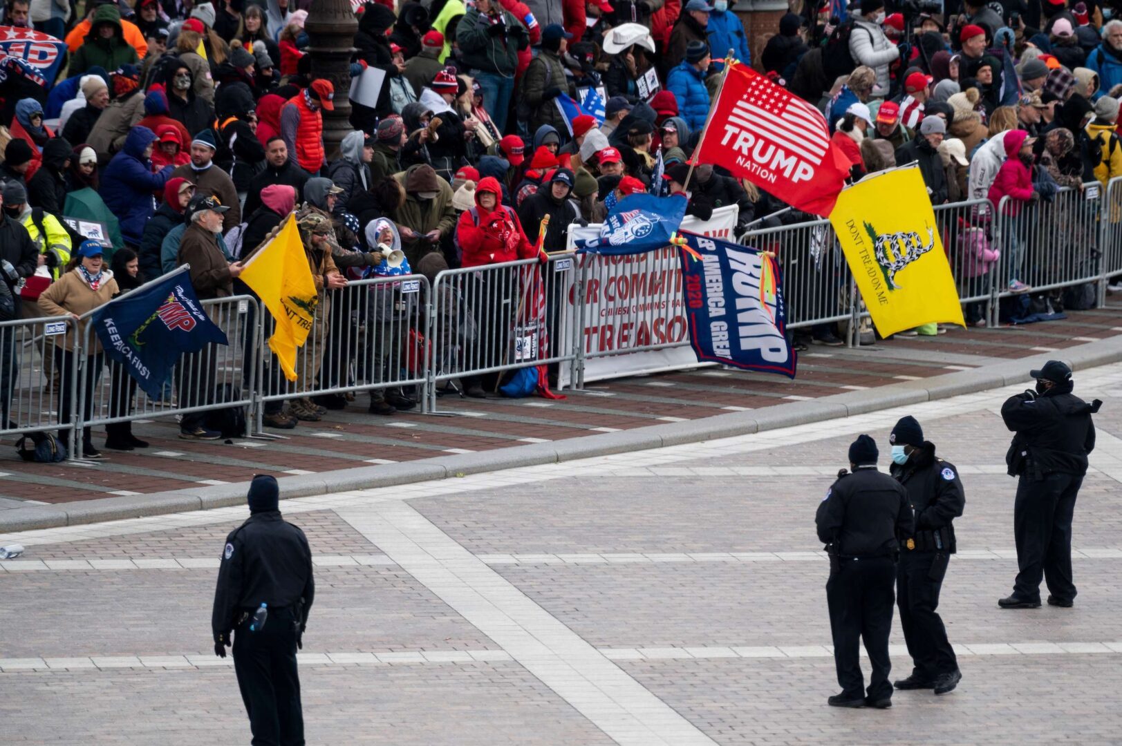 UNITED STATES - JANUARY 6: U.S. Capitol Police line the barricades as Trump rioters gather on the East Front of the Capitol on Wednesday, Jan. 6, 2021, as the Congress works to certify the electoral college votes. (Photo By Bill Clark/CQ Roll Call)