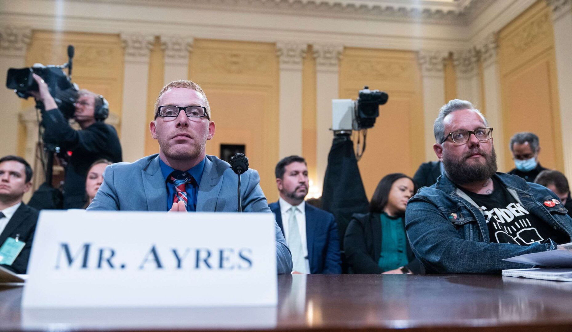 Stephen Ayres, left, who pleaded guilty to charges for participating in the Capitol riot, and former Oath Keepers spokesman Jason Van Tatenhove prepare to testify Tuesday in the House Jan. 6 panel’s hearing to present previously unseen material.