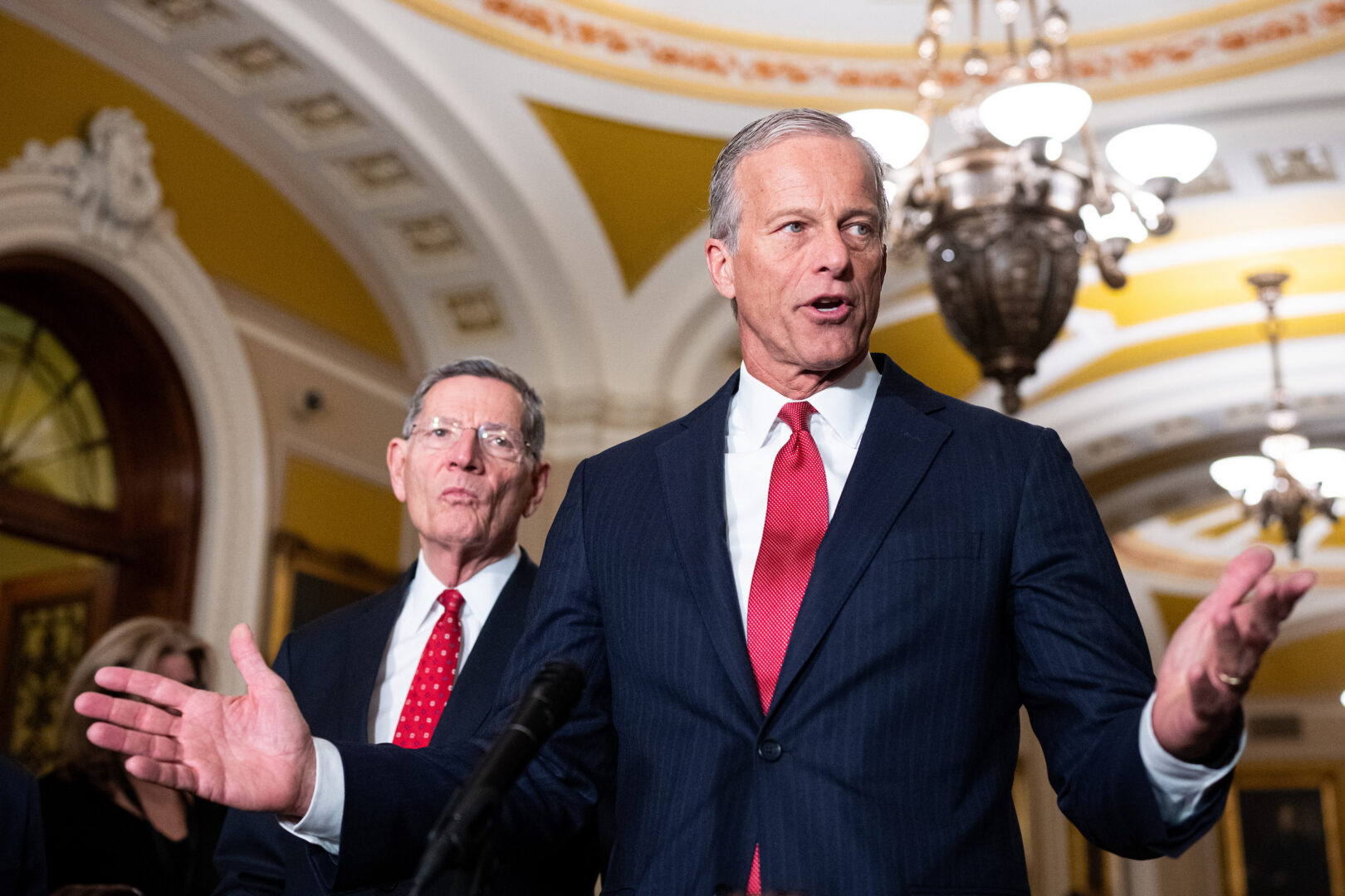 Senate Majority Leader John Thune is seen at the Capitol on Feb. 10 with Sen. John Barrasso, R-Wyo. 