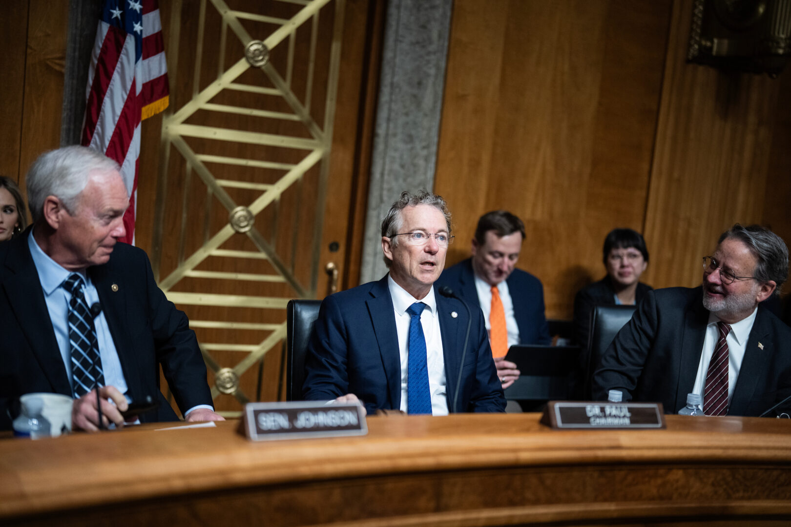 From left, Sens. Ron Johnson, R-Wis., Chairman Rand Paul, R-Ky., and ranking member Sen. Gary Peters, D-Mich., at a Homeland Security and Governmental Affairs Committee markup Thursday on the nomination of Sen. Markwayne Mullin, R-Okla., to be Homeland Security secretary. 