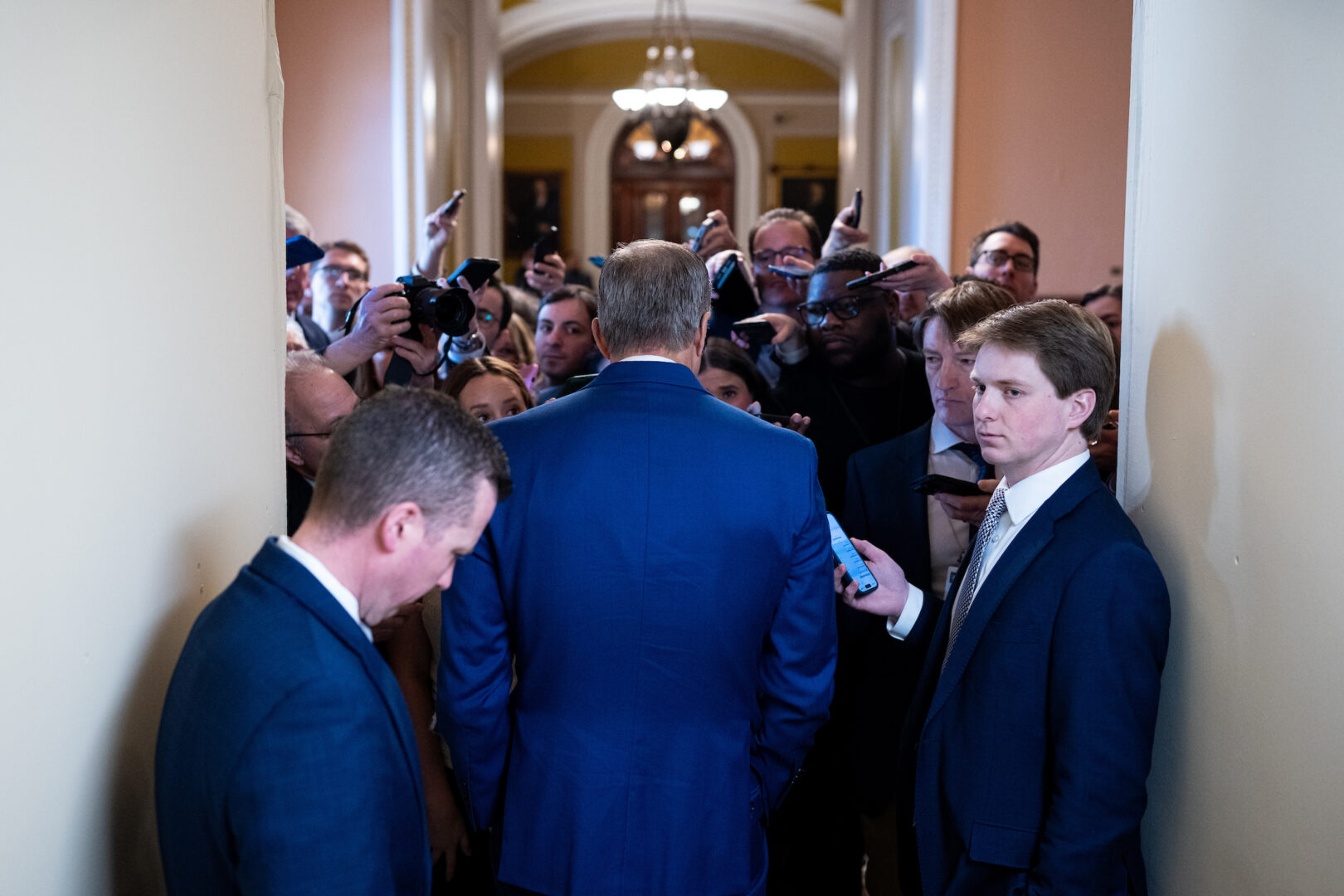 Senate Majority Leader John Thune, R-S.D., speaks to reporters as he returns from the Senate floor to his office in the U.S. Capitol on Tuesday, March 24, 2026. 