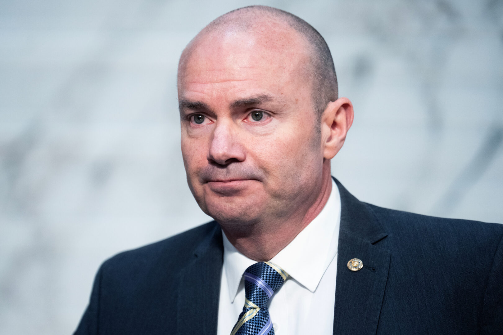 Sen. Mike Lee, seen here in March, had called for a show of Senate force on an election overhaul favored by the president. Now its path forward is murky.