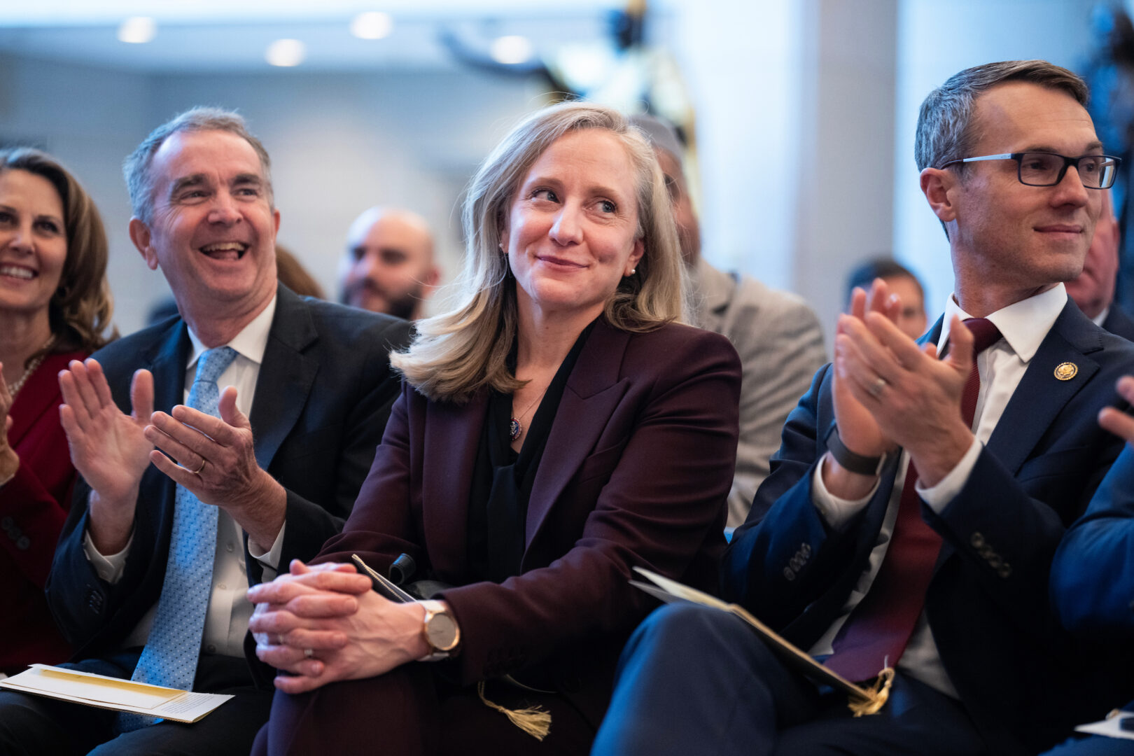 Then-Gov.-elect Abigail Spanberger, former Gov. Ralph Northam, left, and Rep. James R. Walkinshaw, D-Va., attend a statue unveiling ceremony for Barbara Rose Johns in Emancipation Hall in 2025.