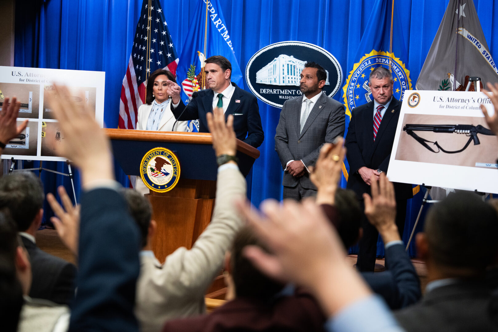 From left, U.S. Attorney Jeanine Pirro, acting Attorney General Todd Blanche, FBI Director Kash Patel, and Darren B. Cox, deputy assistant director of the FBI Criminal Investigative Division, conduct a news conference at the Department of Justice on Monday about the suspect in the White House Correspondents' Dinner. (Tom Williams/CQ Roll Call)