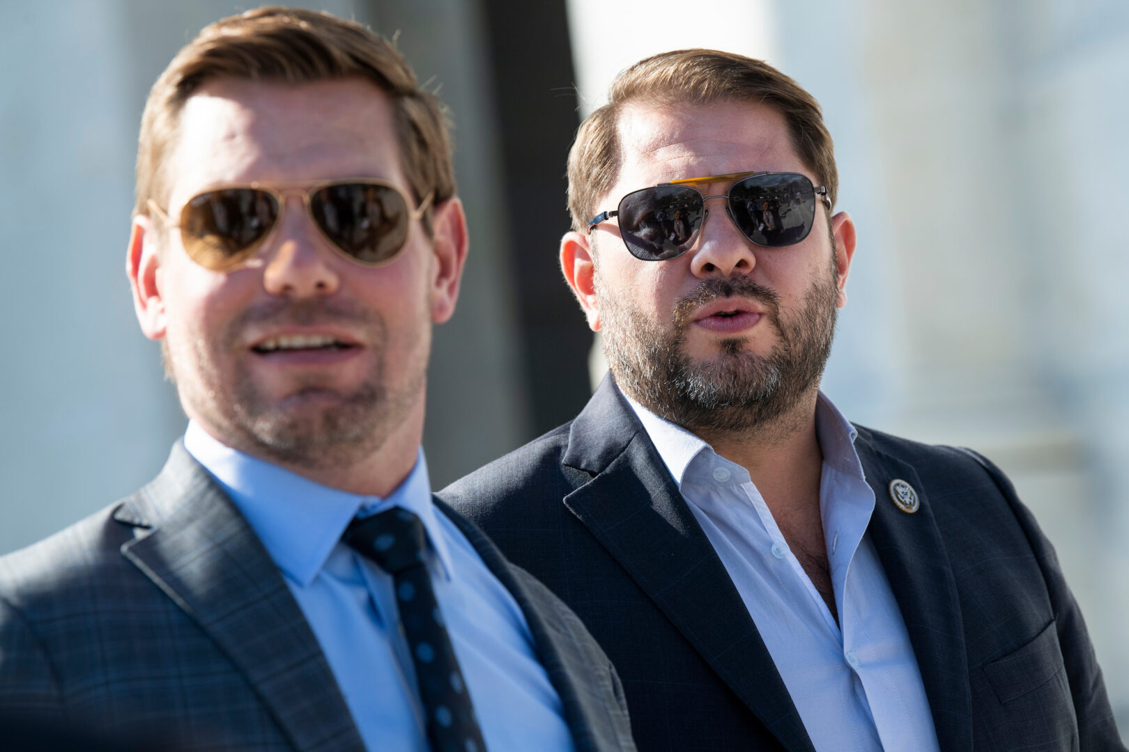 Reps. Eric Swalwell, D-Calif., left, and now-Sen. Ruben Gallego, D-Ariz., arrive to the U.S. Capitol before a House vote in 2021. In the aftermath of Swalwell's resignation, scrutiny has focused on Gallego, a close friend. 