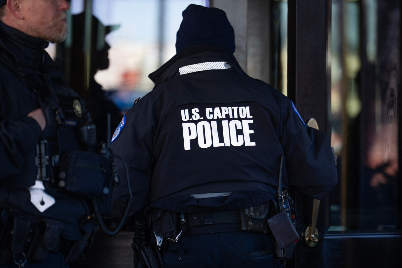 Capitol Police are seen outside the Capitol Hill Club during a meeting among House Republicans in February. A bill passed by the House this week would allow the Capitol Police Board to set a higher age for retirement waivers.