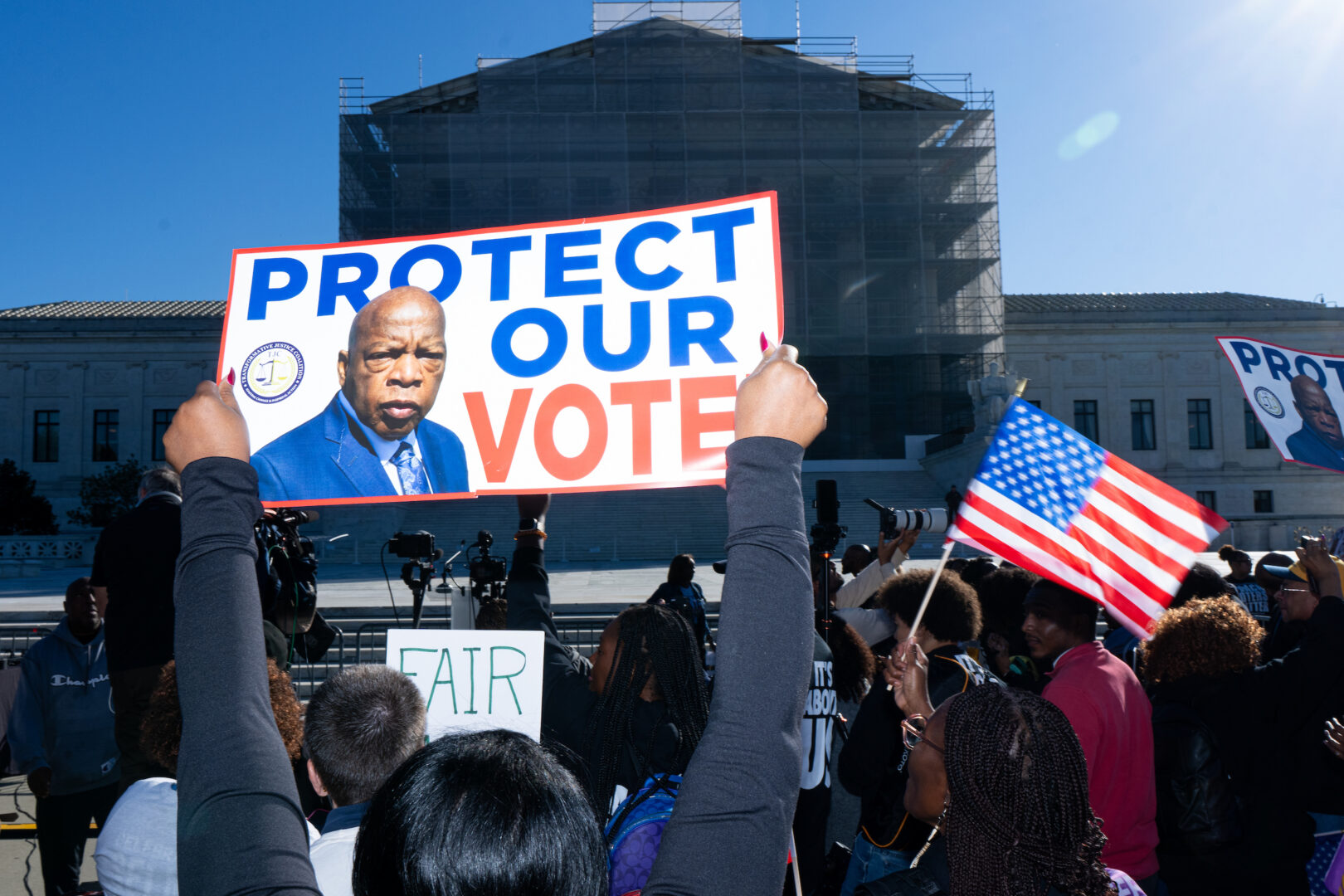 Voting rights activists protest outside the Supreme Court as the court heard arguments in October in a case challenging Louisiana's congressional map. 