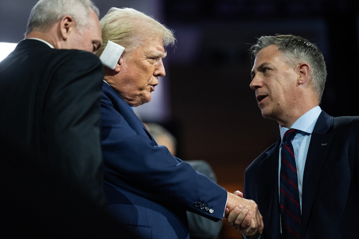 Donald Trump greets Indiana's Jim Banks at the Republican National Convention in Milwaukee in July 2024. Banks, now the state's junior senator, hailed Tuesday's defeat of several GOP state senators who opposed an attempt to redraw the state's congressional map. (Tom Williams/CQ Roll Call)