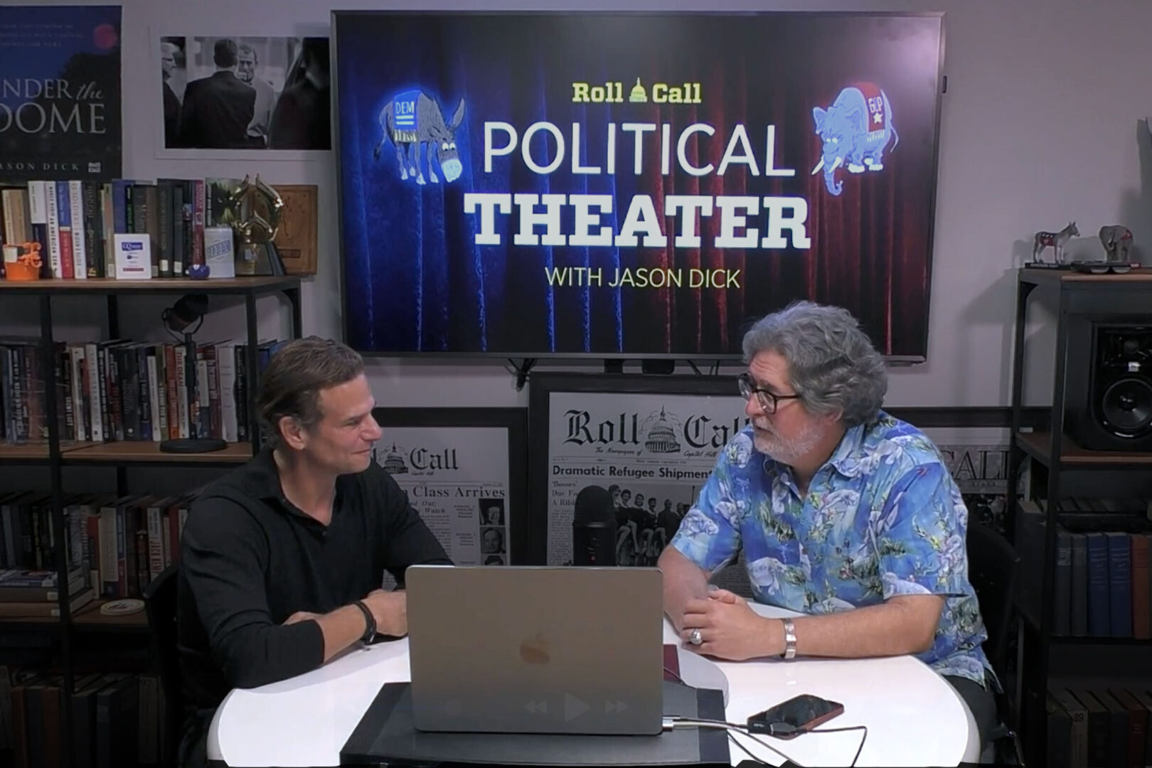 Political Theater host Jason Dick, right, talks with filmmaker Mark Kassen about Kassen's new movie, “PH-1,” a political thriller about a U.S. senator held hostage in his own apartment. 