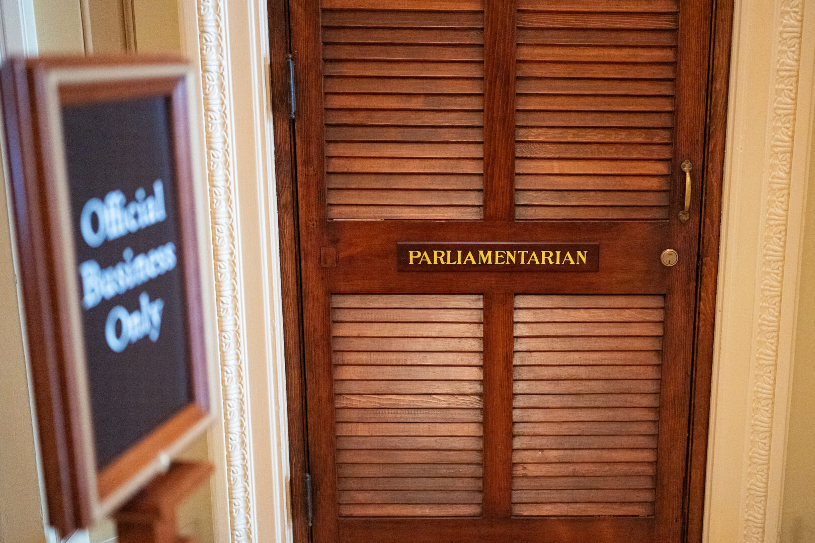 An "official business only” sign stands outside the Senate Parliamentarian’s office last year. 
