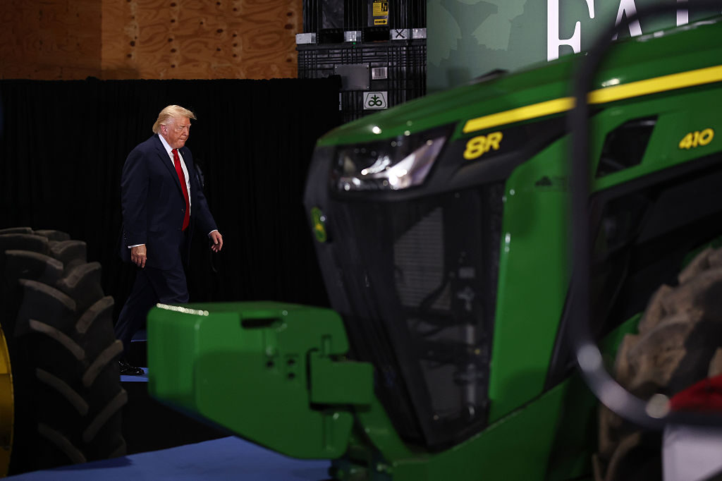 President Donald Trump arrives to speak during an event at Custer Farms on Friday in Chippewa Falls, Wis.