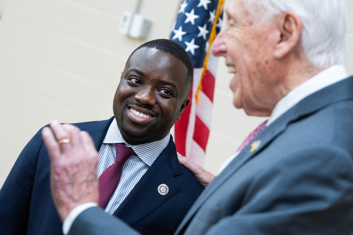 Maryland Del. Adrian Boafo, left, talks with Rep. Steny H. Hoyer during a news conference in Bowie, Md., in March. (Tom Williams/CQ Roll Call)