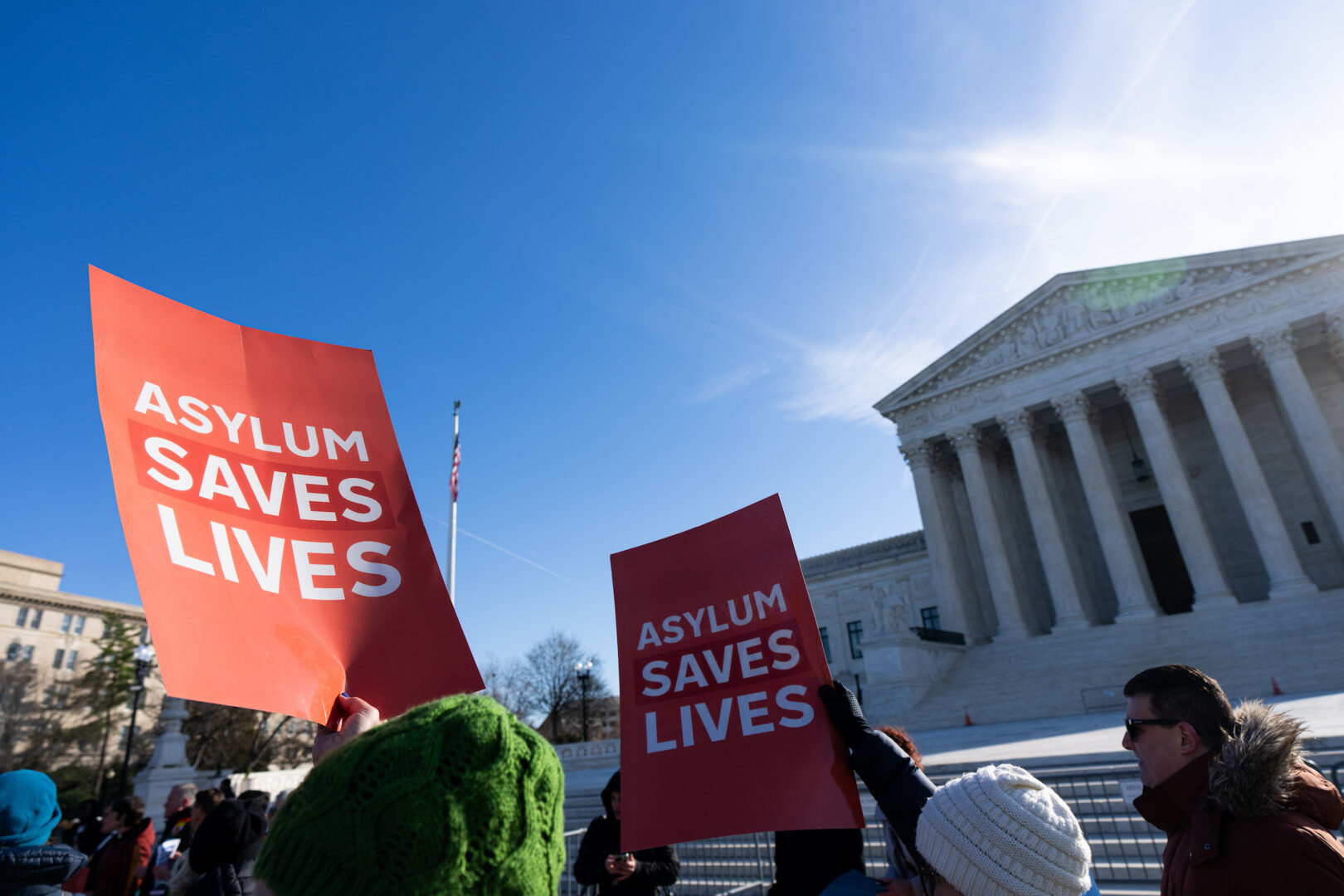 The Kairos Center for Religions, Rights, and Social Justice, along with a coalition of faith-based organizations, hold a vigil before Supreme Court heard arguments in March on denying potential asylum seekers entry to the U.S. 