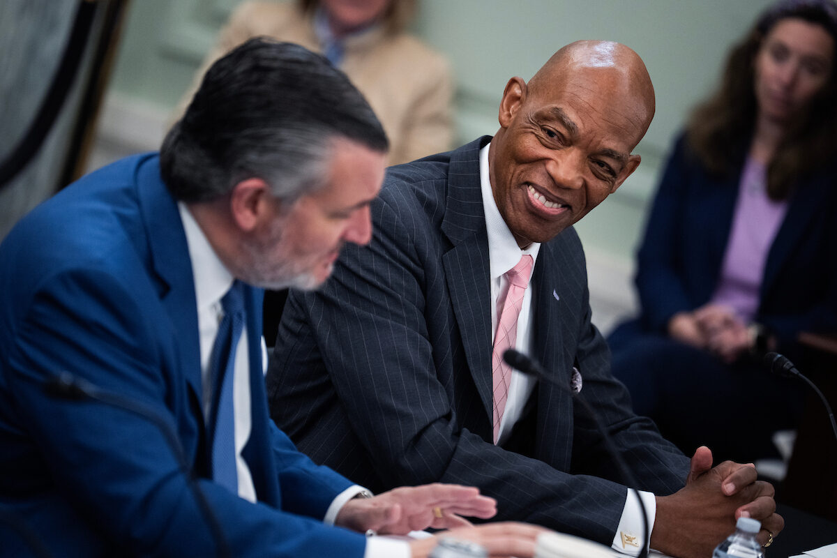 Senate Commerce Chair Ted Cruz, R-Texas, and James W. Crawford III, president of Texas Southern University, at a roundtable on college sports legislation on Wednesday. 