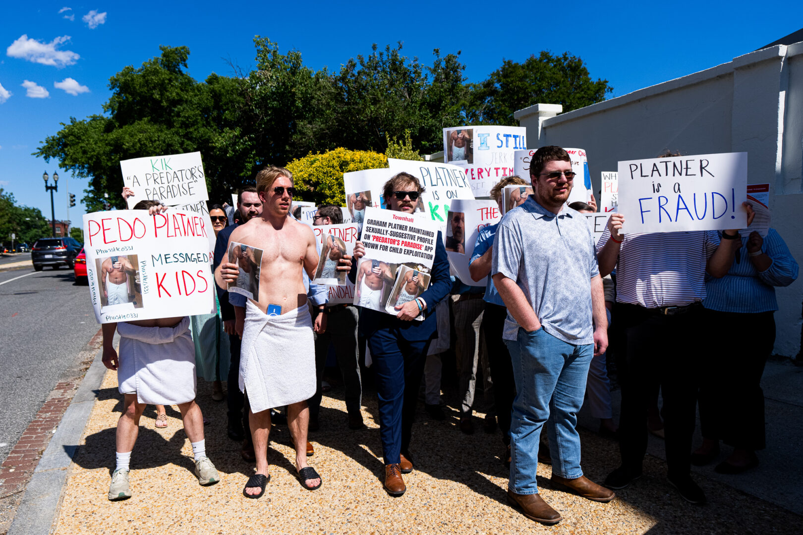 Protesters chant outside the Democratic Senatorial Campaign Committee office where Maine Senate candidate Graham Platner was meeting with Democratic senators in Washington on Tuesday. (Bill Clark/CQ Roll Call)