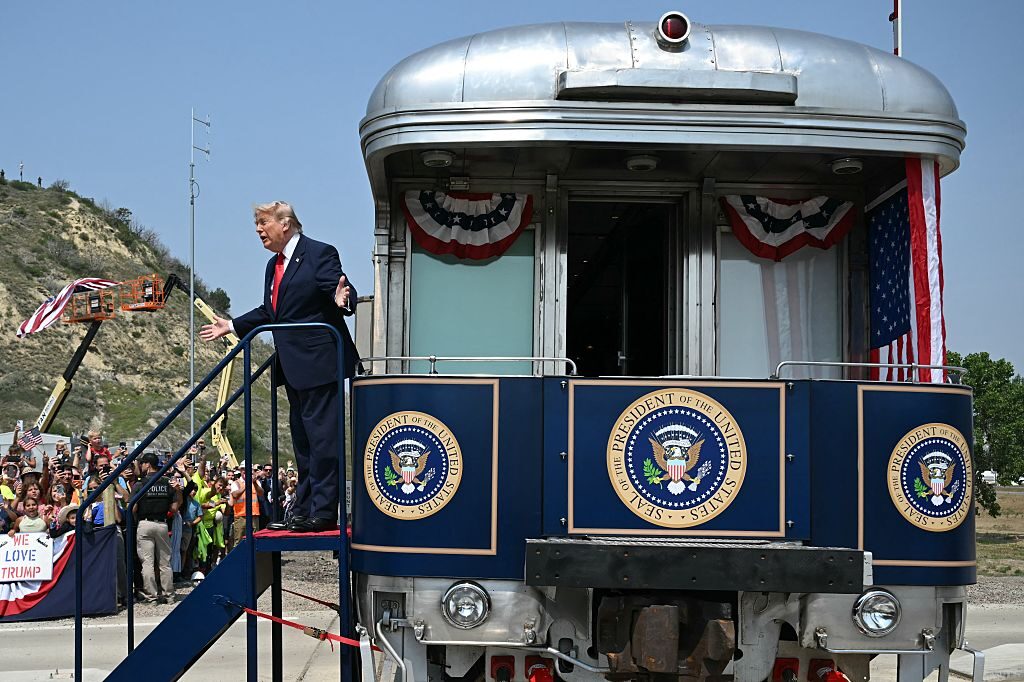 President Donald Trump greets supporters after arriving on the "Freedom250 Train" on his way to attend a dedication ceremony for the Theodore Roosevelt Presidential Library in Medora, N.D., on Wednesday. (AFP via Getty Images)