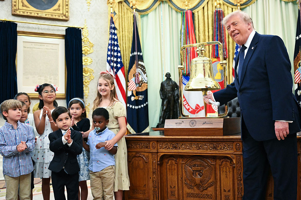 President Donald Trump rings the opening bell for the New York Stock Exchange and Nasdaq during the launch of Trump investment accounts in the Oval Office of the White House on July 6. Trump accounts are a new type of tax-deferred investment account for children.