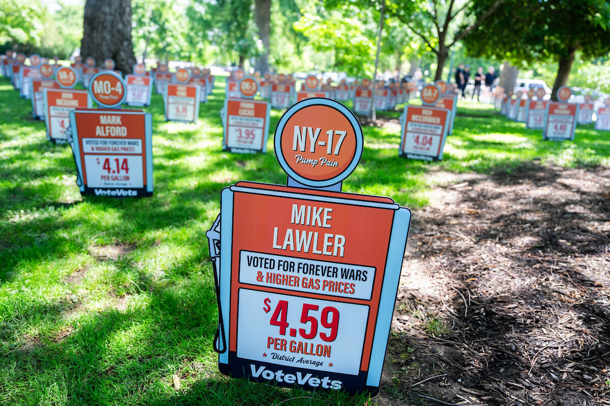 A sign referencing high gas prices and Rep. Mike Lawler, R-N.Y., is seen at an event hosted by VoteVets calling for an end to the Iran war outside the Capitol on May 20. (Tom Williams/CQ Roll Call)